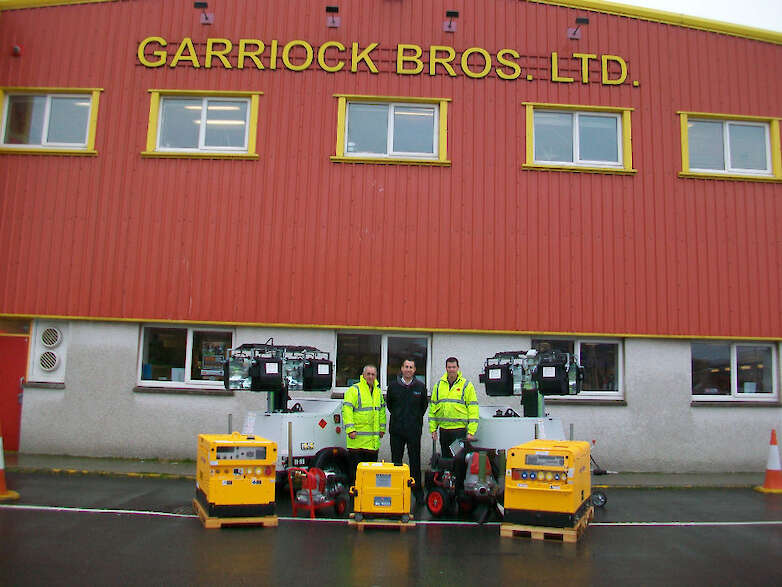 Left - John Strmsek (Director) & Right - Ian Leiper (sales Executive) with Centre - David Gray (Morris Site Machinery) - Garriock Bros. Ltd Lerwick office